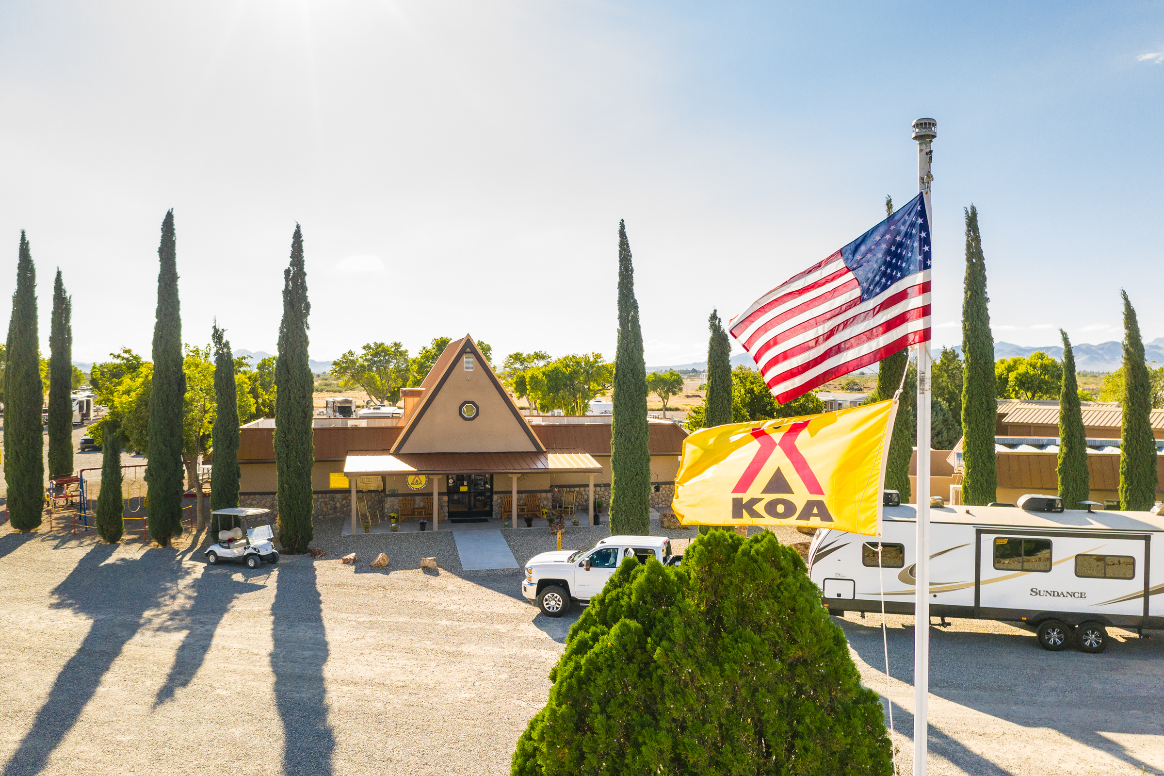 American and KOA flags at campsite