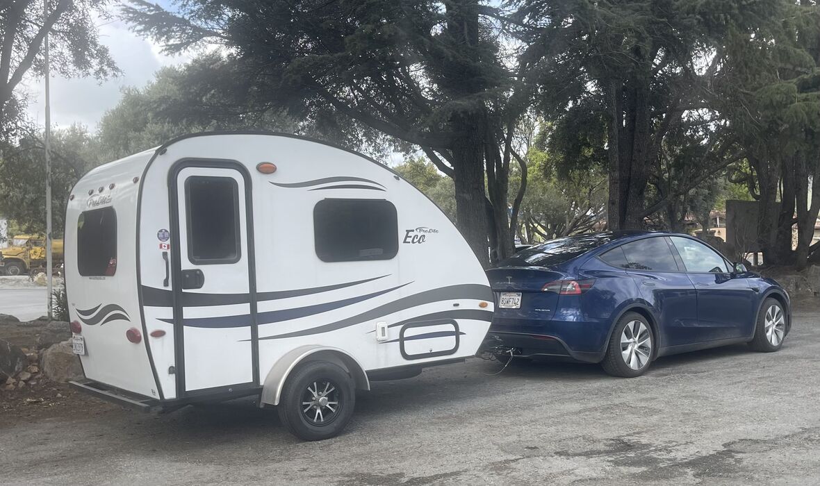 EV with towable in the forest