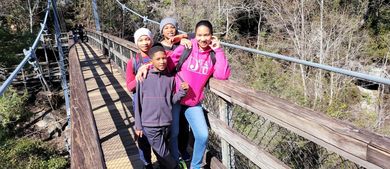 family on a bridge