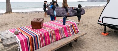 carrying a surfboard