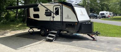 travel trailer in state park campground