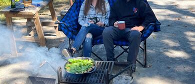 Mike and Flora in sitting outside