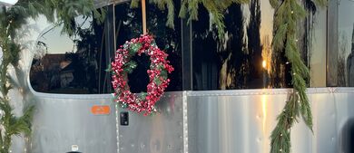 Garland and wreaths on front of RV