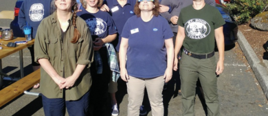 A group of people watching an eclipse.png