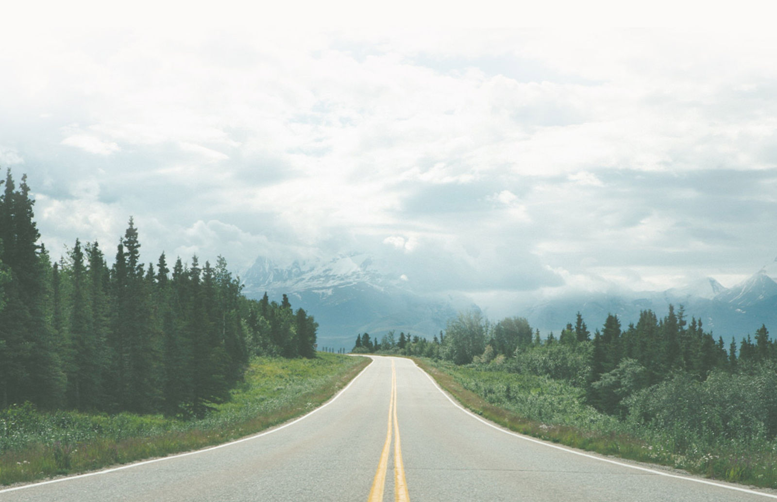 road with clouds in the sky