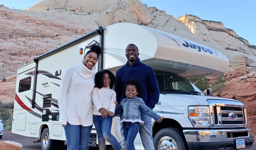 Family in front of RV