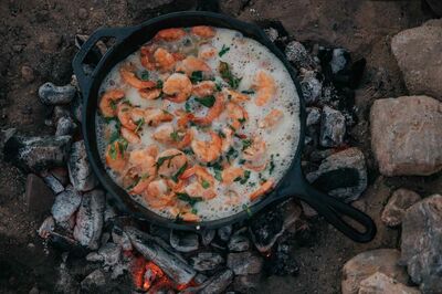 shrimp in skillet over fire