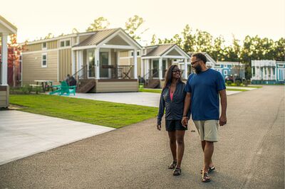 couple walking with Park Models