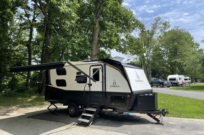 travel trailer in state park campground