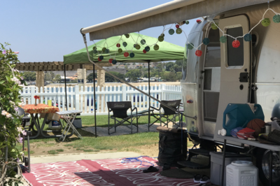 RV setup at campsite during the day