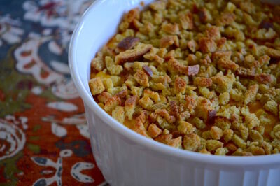 Thanksgiving stuffing in a white bowl on a table