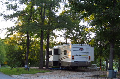 RV on gravel in the woods.jpg