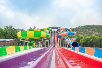 Two water slides on a cloudy day