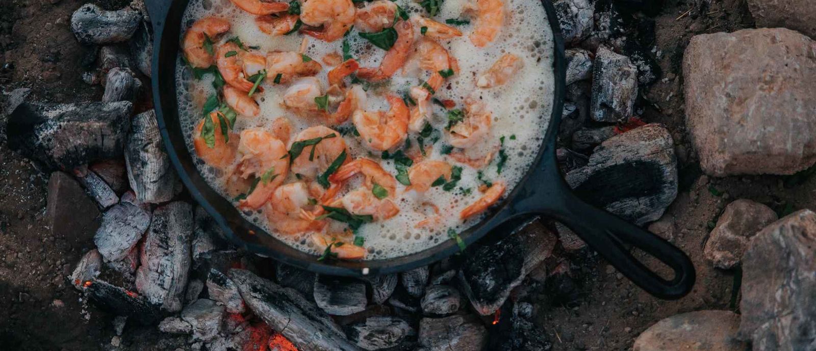 shrimp in skillet over fire