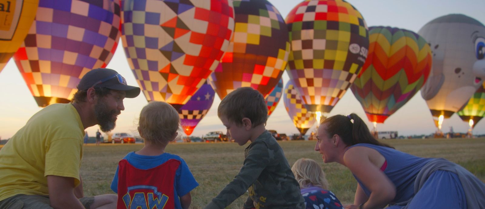Family enjoying hot air balloons