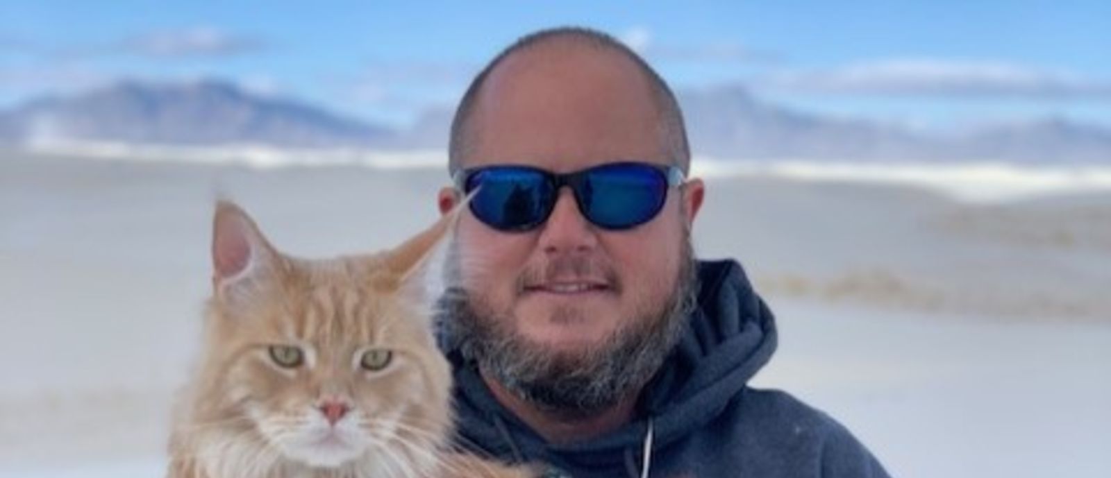 Scott Russel and Fisher the Maine Coon