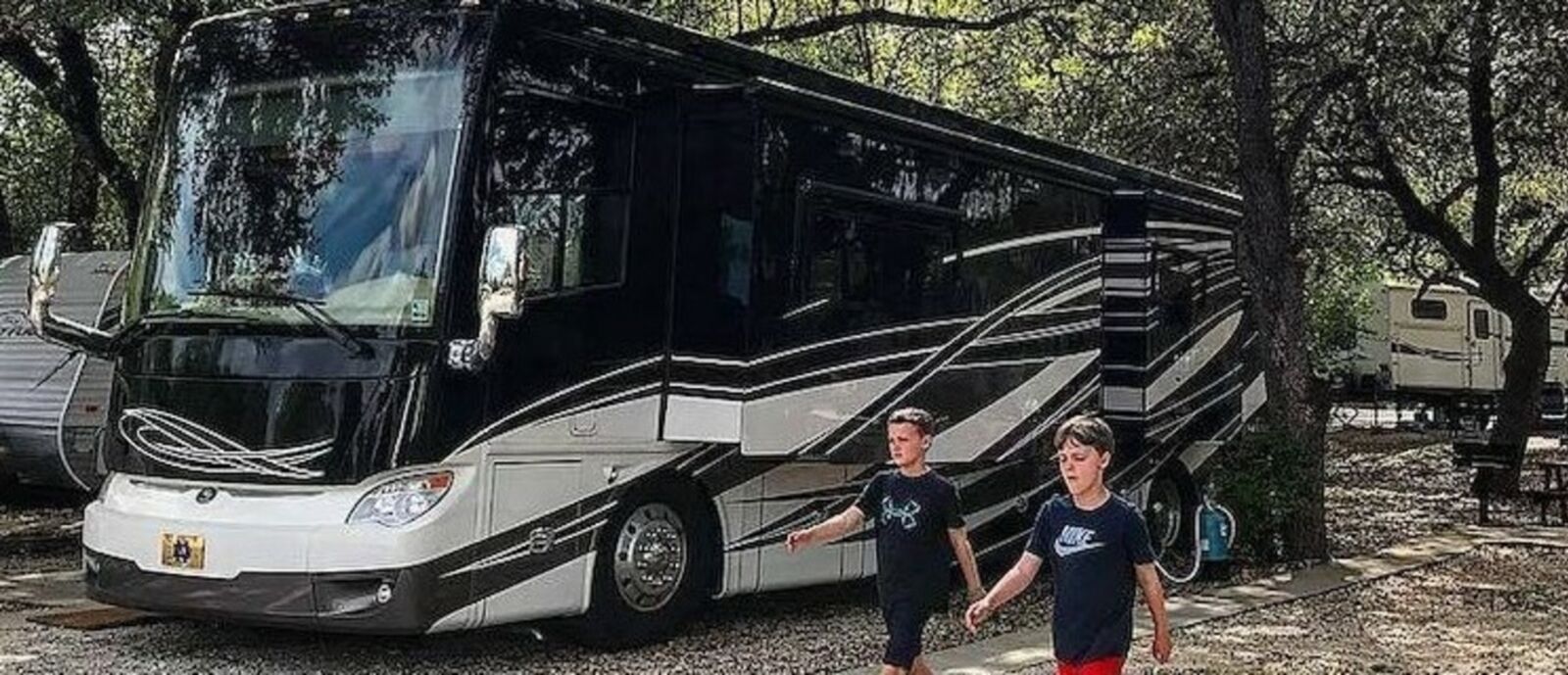 Class A motorhome in forest