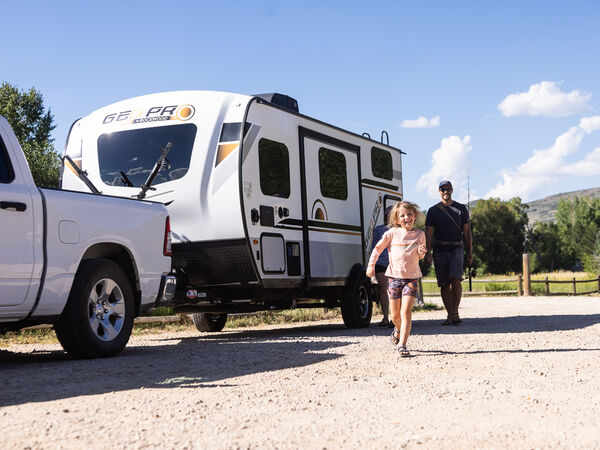 Family leaving their RV to go explore the outdoors
