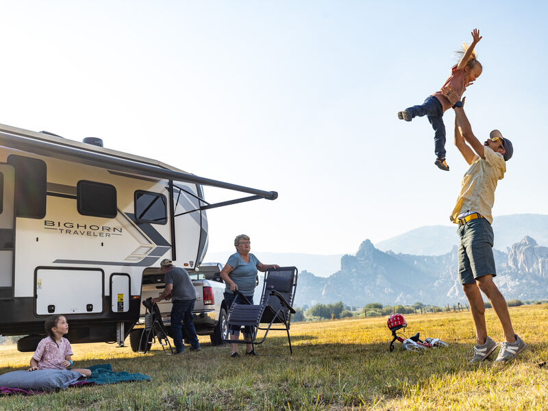Family spending time together with mountains in the background
