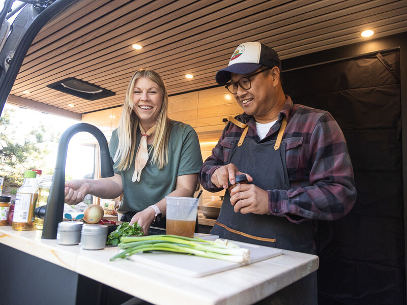 RVers cooking in their RV