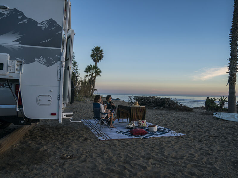 RVers enjoying beach near their RV