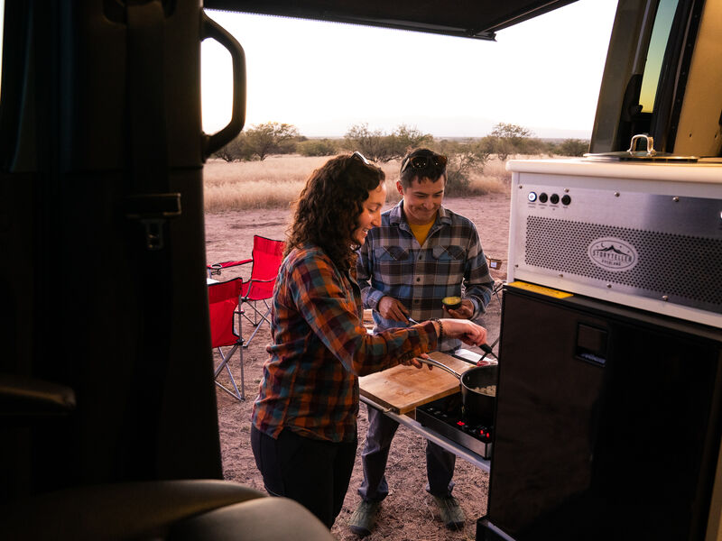 RVers prepare a meal