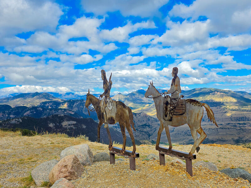 A landmark with the mountainous view in the distance