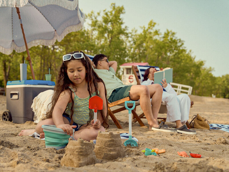 Family time on beach_Credit to VisitErie