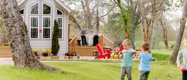 kids playing next to a park model