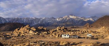 travel trailer and truck camper outdoors
